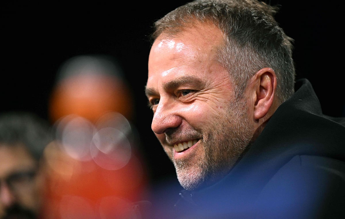 Barcelona's German head coach Hansi Flick addresses a press conference on the eve of the UEFA Champions League quarter-final second-leg football match BVB Borussia Dortmund v FC Barcelona at the Signal Iduna stadium in Dortmund on 14 April, 2025