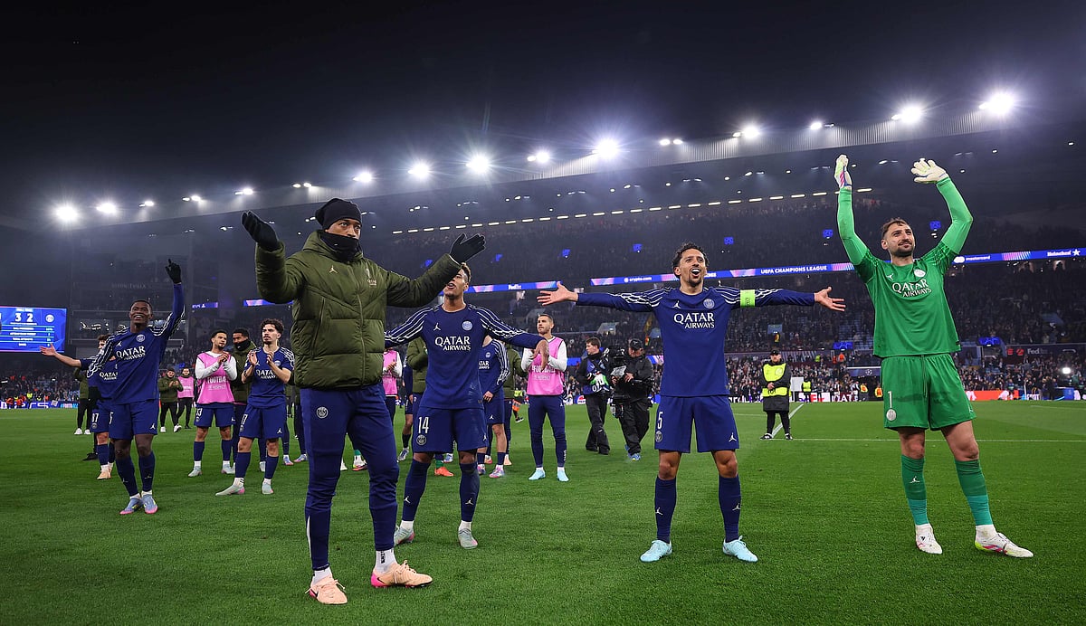 Paris Saint-Germain's French midfielder #14 Desire Doue, Paris Saint-Germain's Brazilian defender #05 Marquinhos and Paris Saint-Germain's Italian goalkeeper #01 Gianluigi Donnarumma celebrate after the UEFA Champions League quarter-final second-leg football match between Aston Villa and Paris Saint-Germain at Villa Park in Birmingham, central England on 15 April 2025.