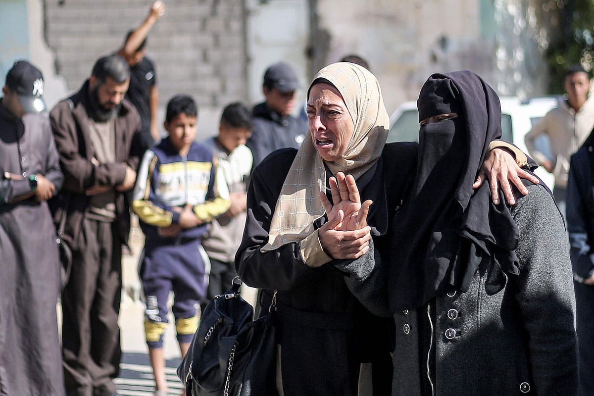 Mourners react during the funeral of victims from the Abu al-Rus family who were killed in a reported Israeli strike on a tent shelter in Khan Yunis in the southern Gaza Strip, at Nasser Medical Complex in Khan Yunis on 17 April, 2025.
