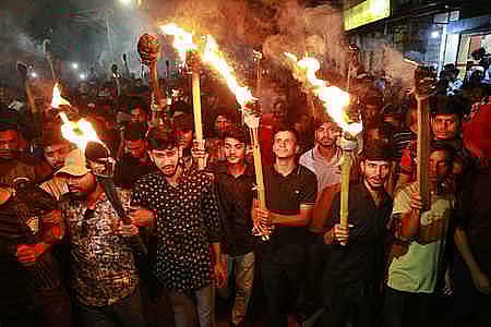 Students of the polytechnic institute  carry out a torch procession in the evening on 17 April 2025.