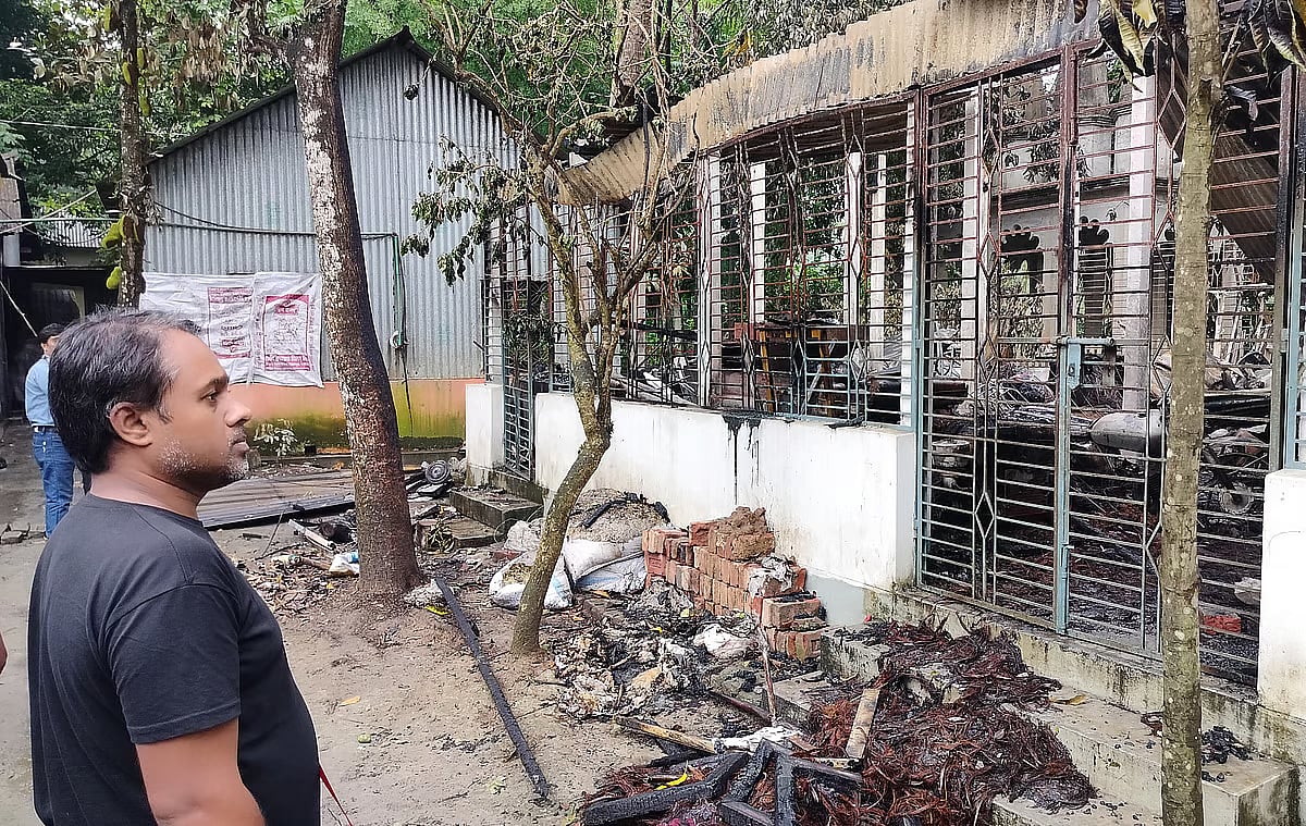 Artist-sculptor Manabendra Ghosh, a prominent alumnus of the Faculty of Fine Arts of Dhaka University, at the ruins at his house in Chandair in Sadar upazila of Manikganj on 18 April a day after miscreants set fire to his house, burning his collections of sculptures and artworks.