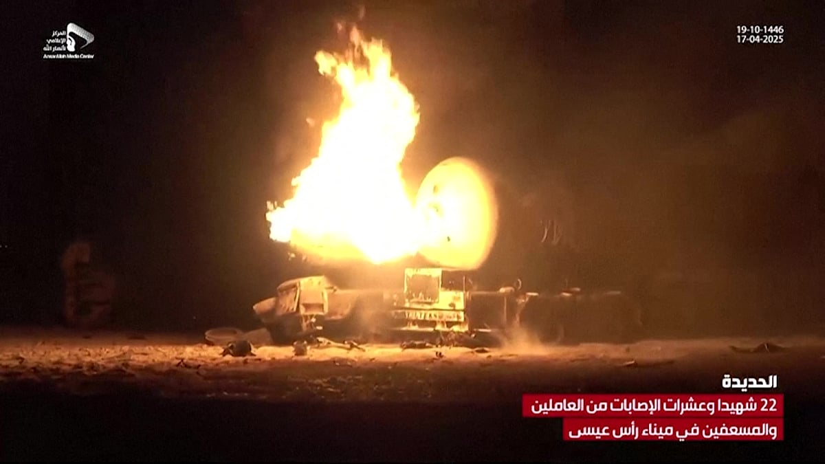 This grab taken from footage released by al-Masirah TV station of Yemen's Huthis shows fire and destruction at the site of US strikes on the Ras Issa fuel port in western Yemen on 18 April, 2025