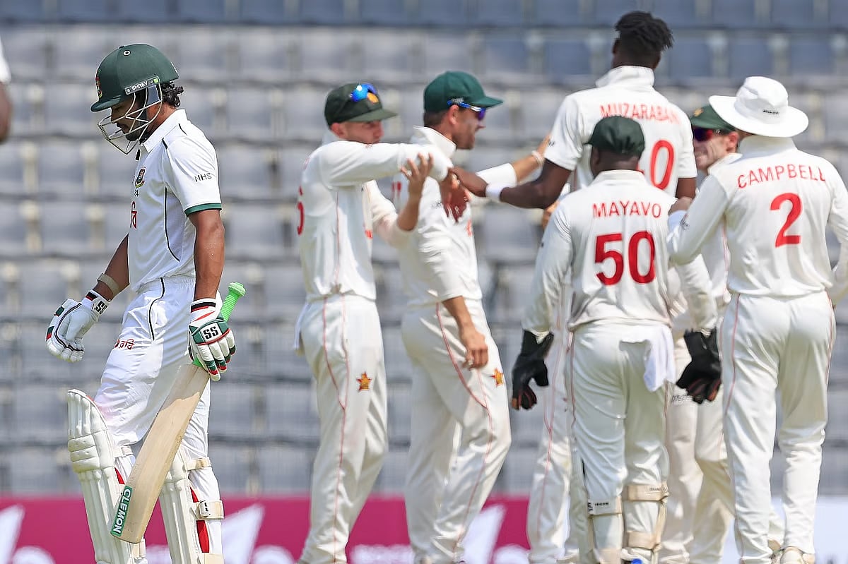 Zimbabwe players celebrate the wicket of Bangladesh skipper Najmul Hossain Shanto on the first day of first Test in Sylhet on 20 April 2025