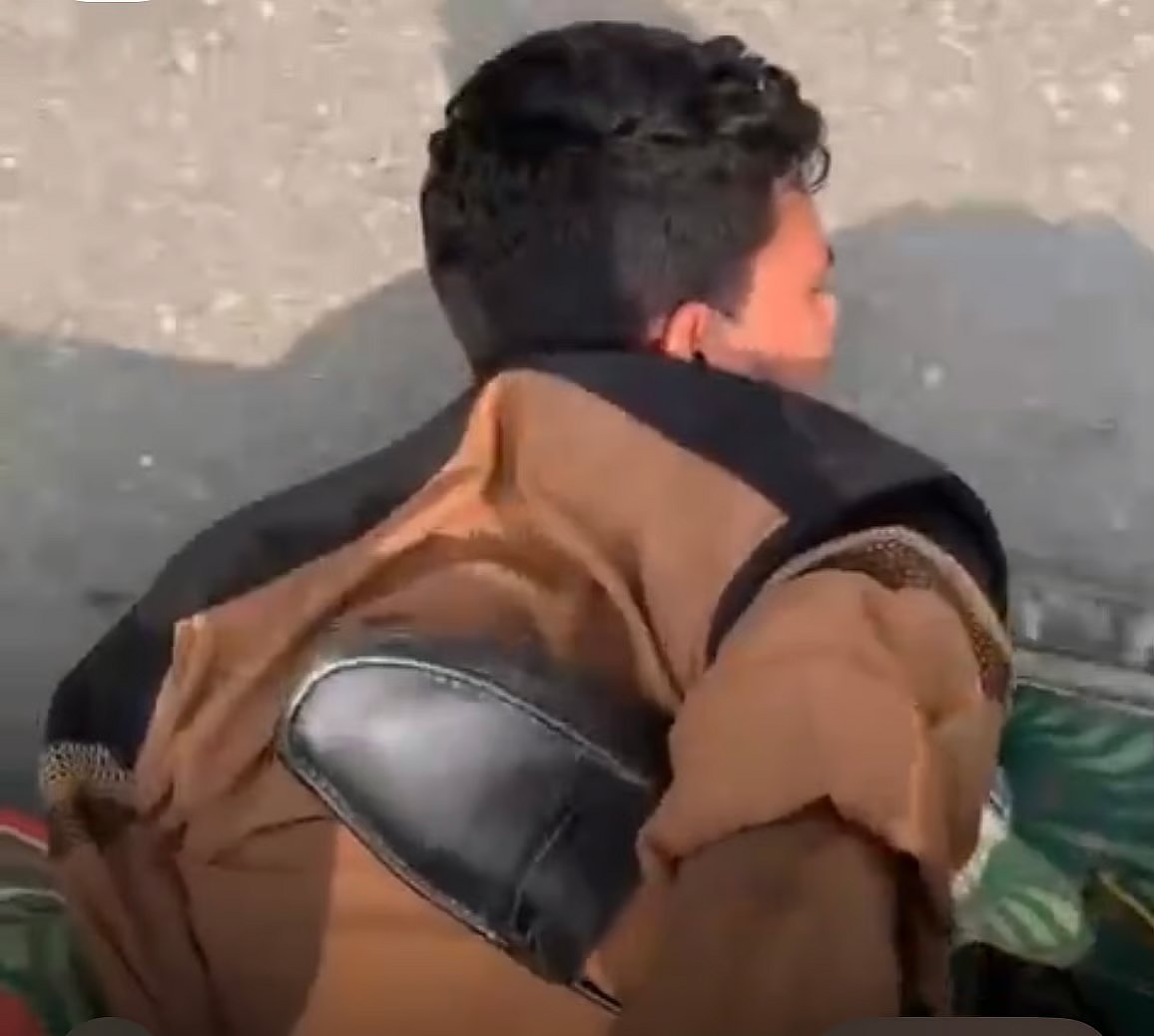 Victim Chhatra League member Faisal Hossain was subjected to public humiliation and physical abuse. Photo taken In Kanaikhali area of Natore city on 19 April 2025.