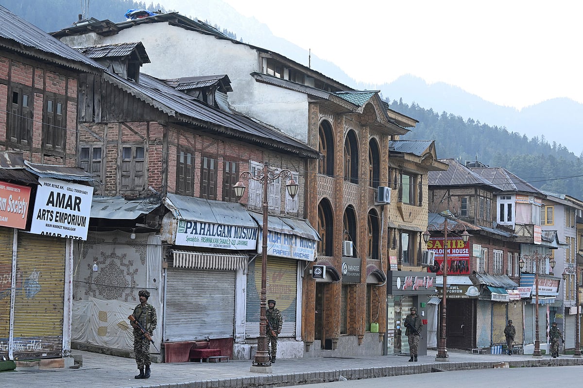 Indian paramilitary personnel conduct a patrol in Pahalgam, south of Srinagar on April 23, 2025, following an attack. At least 26 people were killed 22 April in Indian-administered Kashmir when gunmen opened fire on tourists, security sources told AFP, in the insurgency-hit region's deadliest attack on civilians since 2000