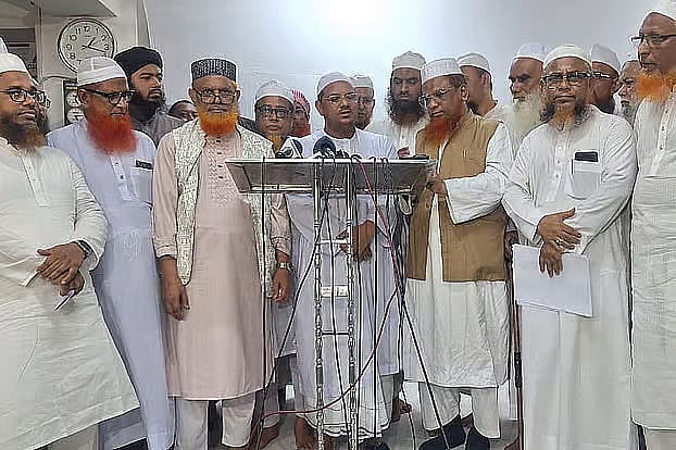 IAB's Ameer Syed Rezaul Karim speaks after holding a meeting with Islamist parties