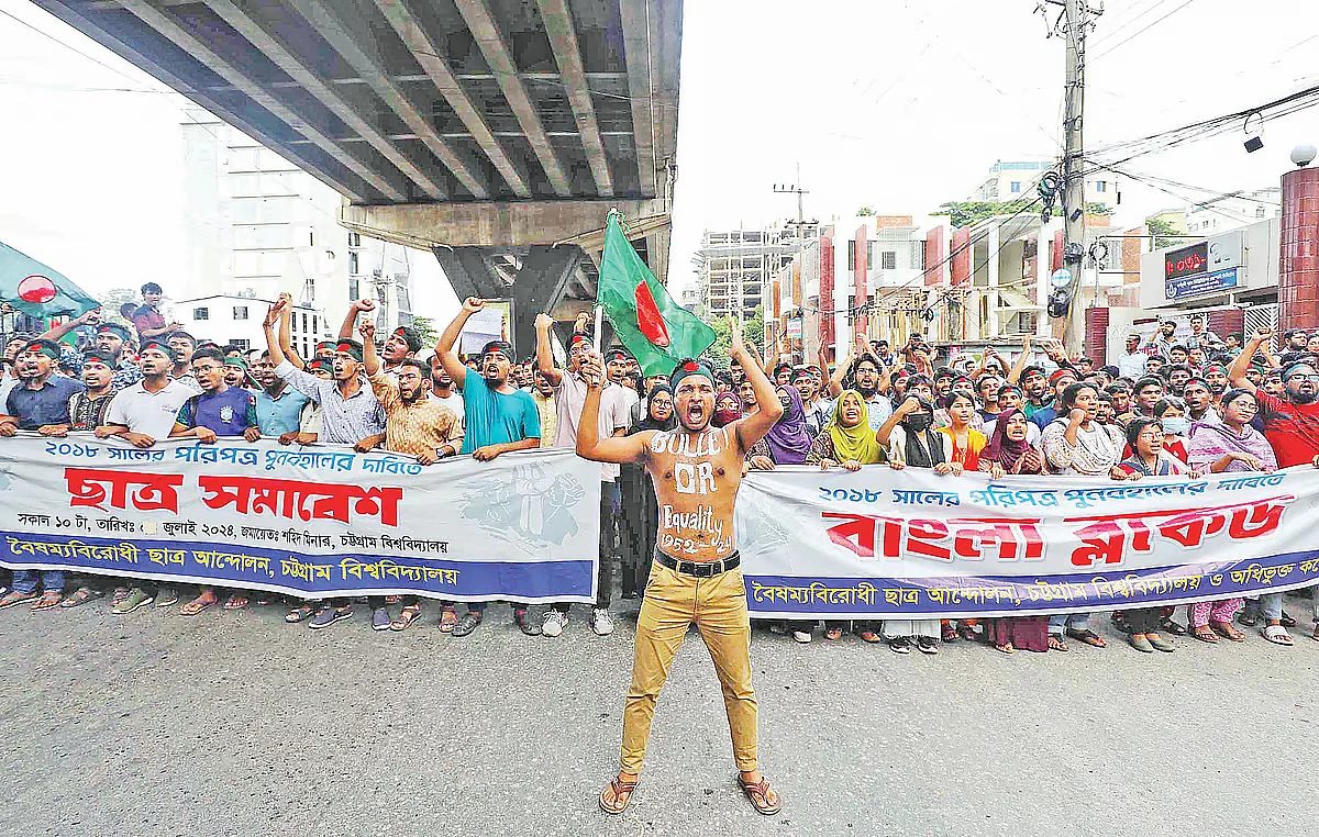 A fearless youth took to the streets writing a slogan on his chest - Bullets or Equality - during the mass uprising in Chattogram