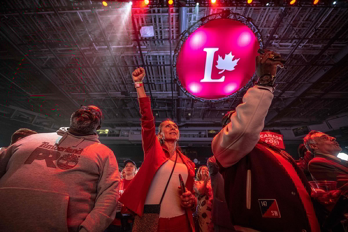 Supporters react at an election night event for Canadian Prime Minister and Liberal Party leader Mark Carney as early polling results indicate a Liberal victory in the federal elections on 28 April 2025 in Ottawa, Canada.