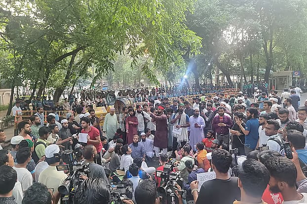 NCP leaders and activists protest in front of the chief adviser's residence, Jamuna. The photo was taken at 6:00 am.