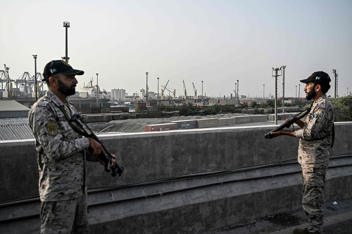 Security personnel stands guard near the Karachi Port in Karachi on 9 May 2025, amid the ongoing border tensions between India and Pakistan after the Kashmir tourist attack