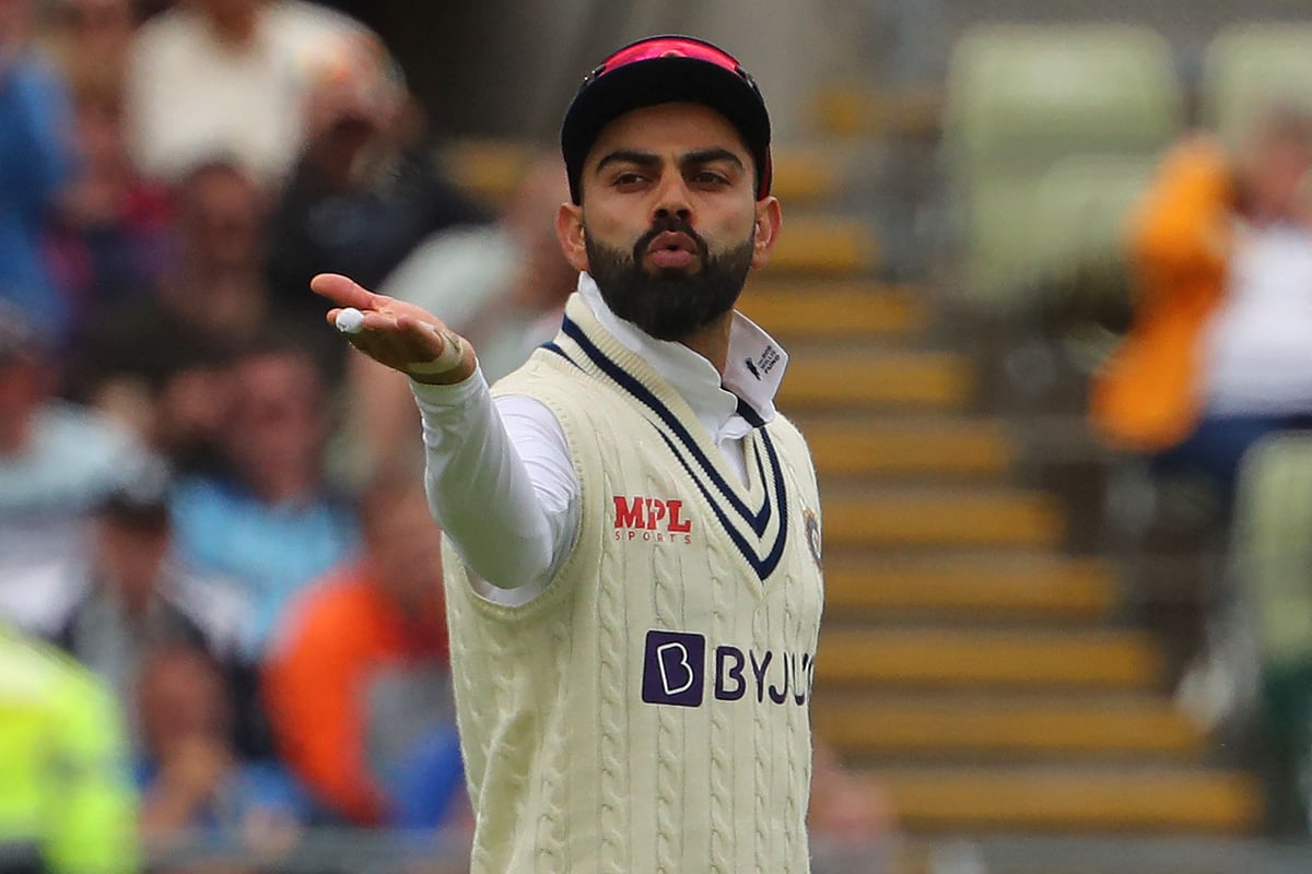 India's Virat Kohli blows a kiss as he celebrates taking a catch to dismiss England's Jonny Bairstow during play on Day 3 of the fifth cricket Test match between England and India at Edgbaston, Birmingham in central England on July 3, 2022