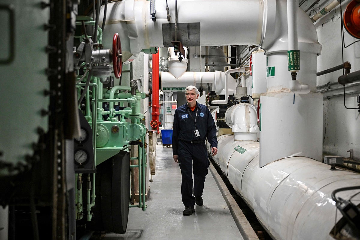 Chiller Plant supervisor David Lindsay walks past pipes at the Chiller Plant at United Nations Headquarters on 10 April 2025 in New York.