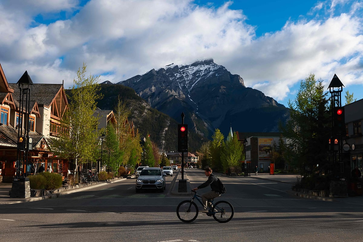 A cyclist makes their way through downtown Banff ahead of the G7 Finance Ministers and Central Bank Governors’ Meeting in Banff, Alberta, Canada on 20 May 2025.