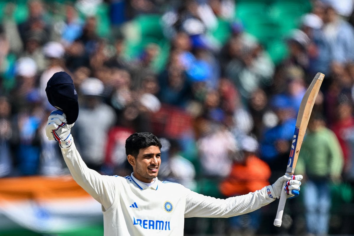 India's Shubman Gill celebrates after scoring a century (100 runs) during the second day of the fifth Test cricket match between India and England at the Himachal Pradesh Cricket Association Stadium in Dharamsala on 8 March 2024.