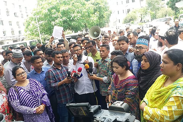Before submitting memorandums to the finance and law advisers, leaders of the Bangladesh secretariat officers and employees unity forum addressed a brief rally at Badamtala in the secretariat on 3 June, 2025.