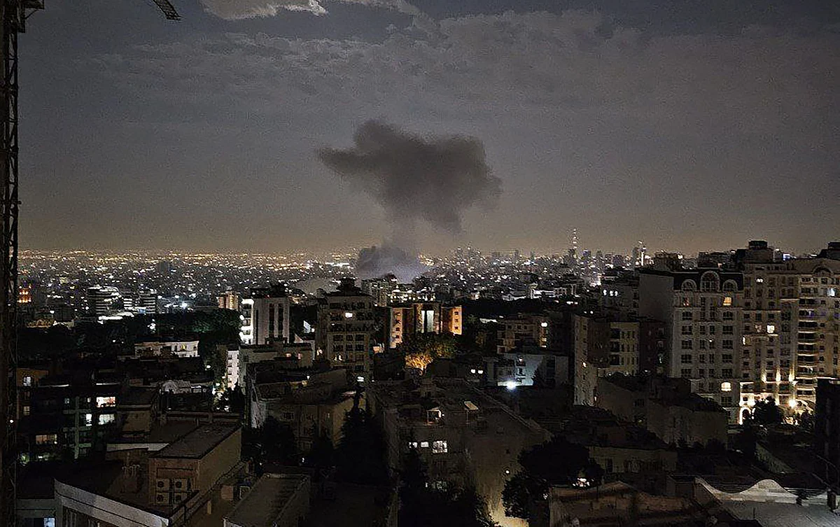 This handout photo released by Iran's Revolutionary Guard Corps (IRGC) official Sepah News Telegram channel on June 13, 2025 shows smoke billowing from a site reportedly targeted by an Israeli strike in the Iranian capital Tehran early in the morning