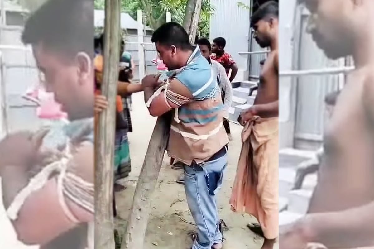 Photo shows Nur Amin tied to a tree in Bhatilongorpara village at Khariya Kazirchar Union of Sreebardi Upazila in Sherpur on 15 June 2025, allegedly in the name of collecting a debt.