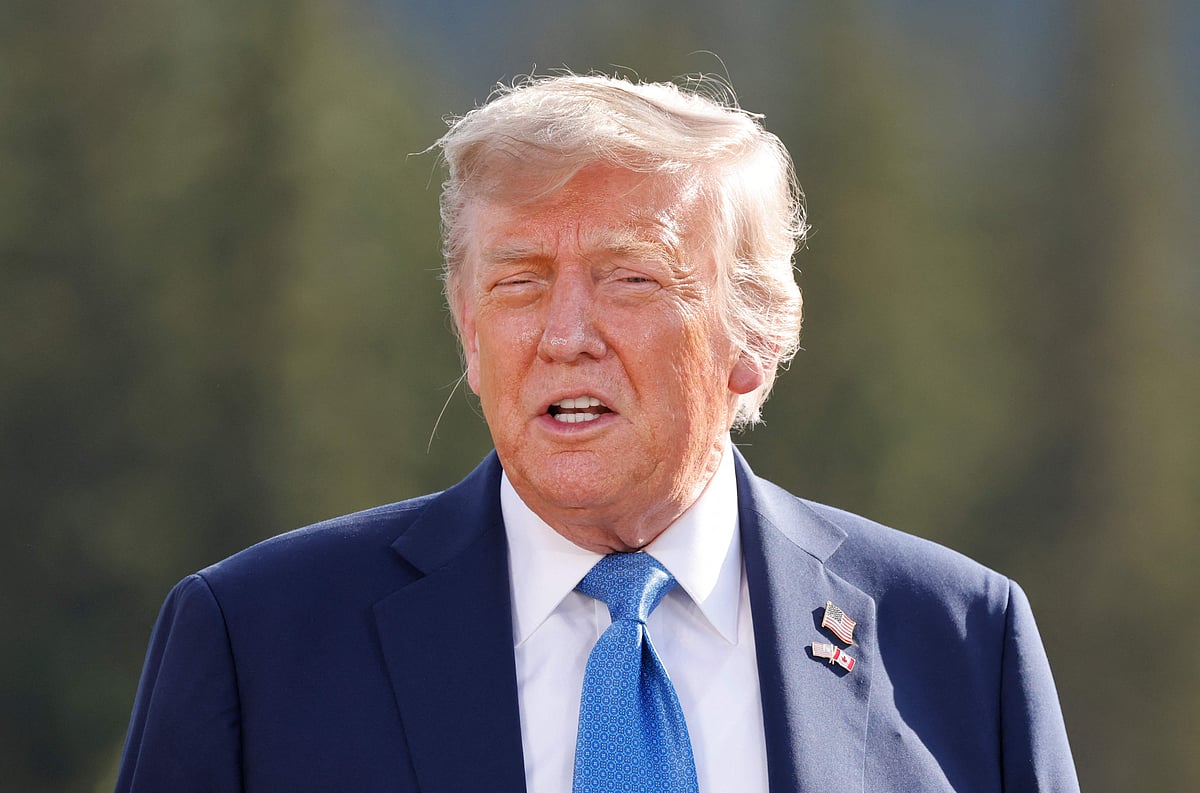US President Donald Trump participates in a family photo during the Group of Seven (G7) Summit at the Kananaskis Country Golf Course in Kananaskis, Alberta, Canada on 16 June 2025.