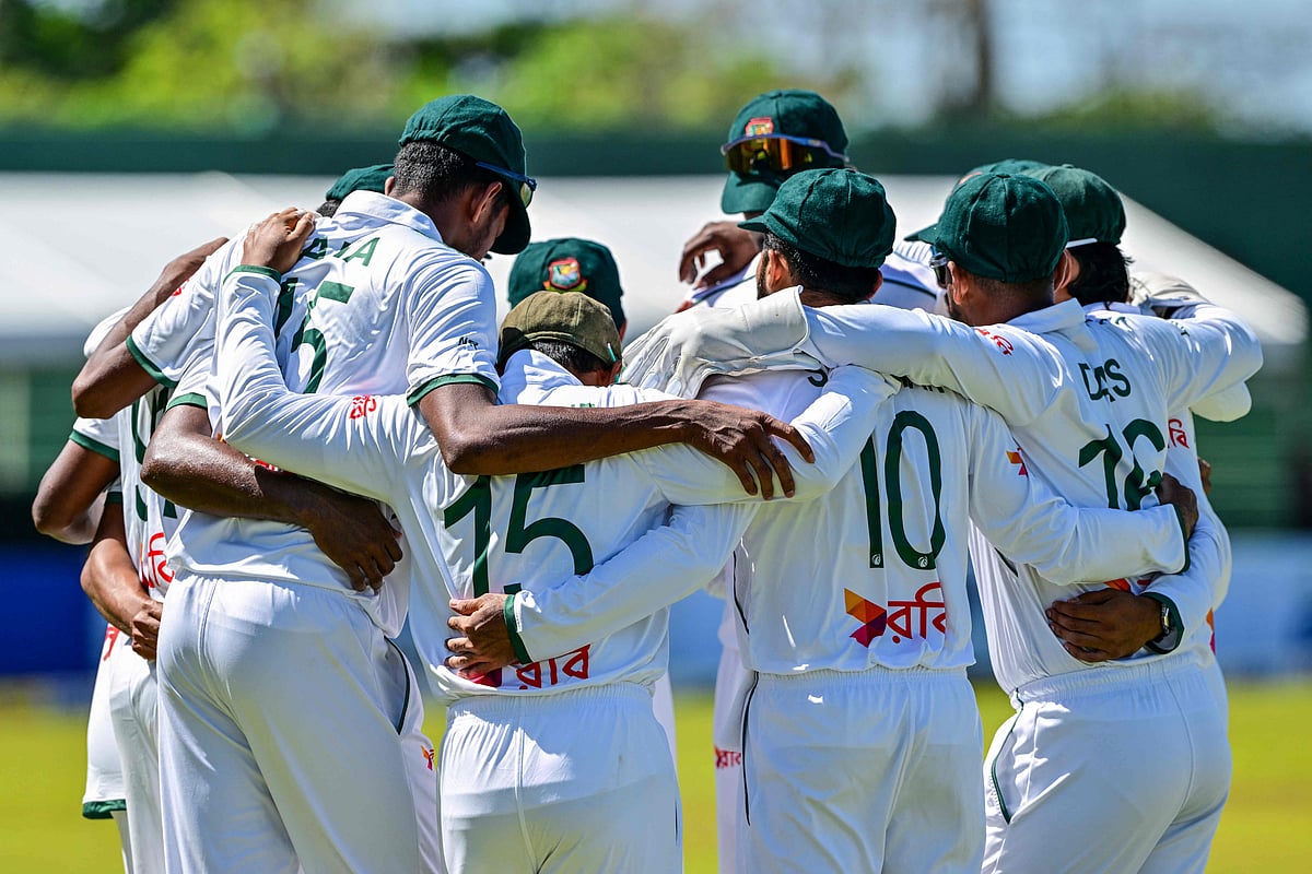 Bangladesh’s players huddle before the start of Sri Lanka’s first inning during the third day of the first Test cricket match between Sri Lanka and Bangladesh at the Galle International Cricket Stadium in Galle on 19 June 2025