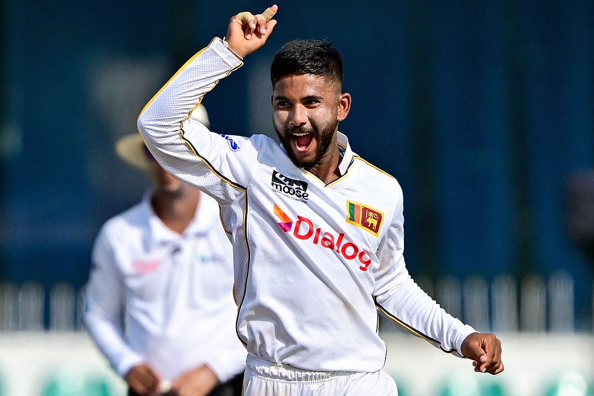 Sri Lanka's Sonal Dinusha celebrates after taking the wicket of Bangladesh's Litton Das during the first day of the second Test cricket match between Sri Lanka and Bangladesh at the Sinhalese Sports Club (SSC) in Colombo on 25 June, 2025