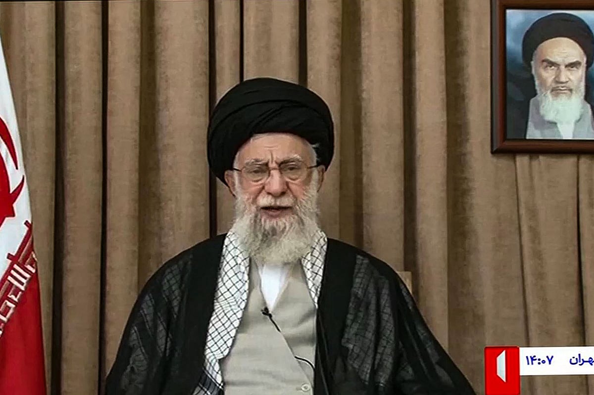 This image grab taken from footage broadcast by Iran's IRIB news state television on 26 June 2025, shows Iran's supreme leader, Ayatollah Ali Khamenei, addressing the nation in front of a portrait of his predecessor, the late founder of the Islamic republic Ayatollah Ruhollah Khomeini.