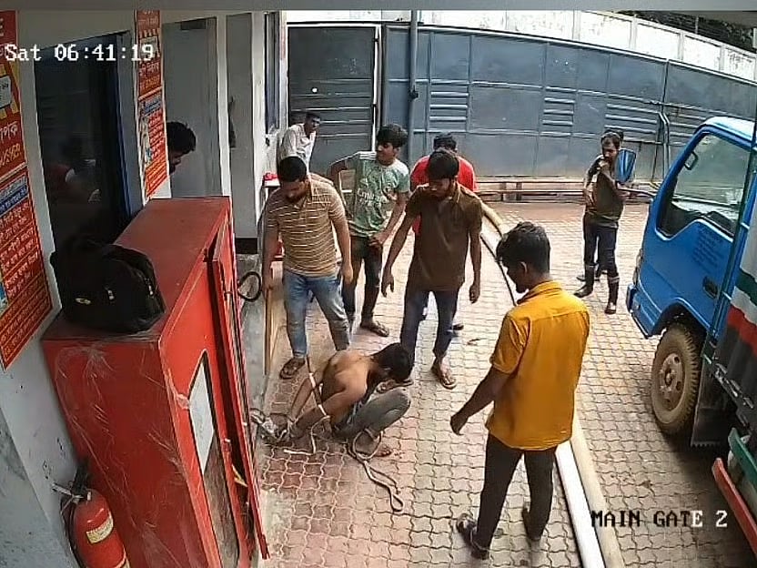 Hridoy is being beaten by unidentified men in Greenland Limited factory in Gazipur’s Konabari on Saturday morning