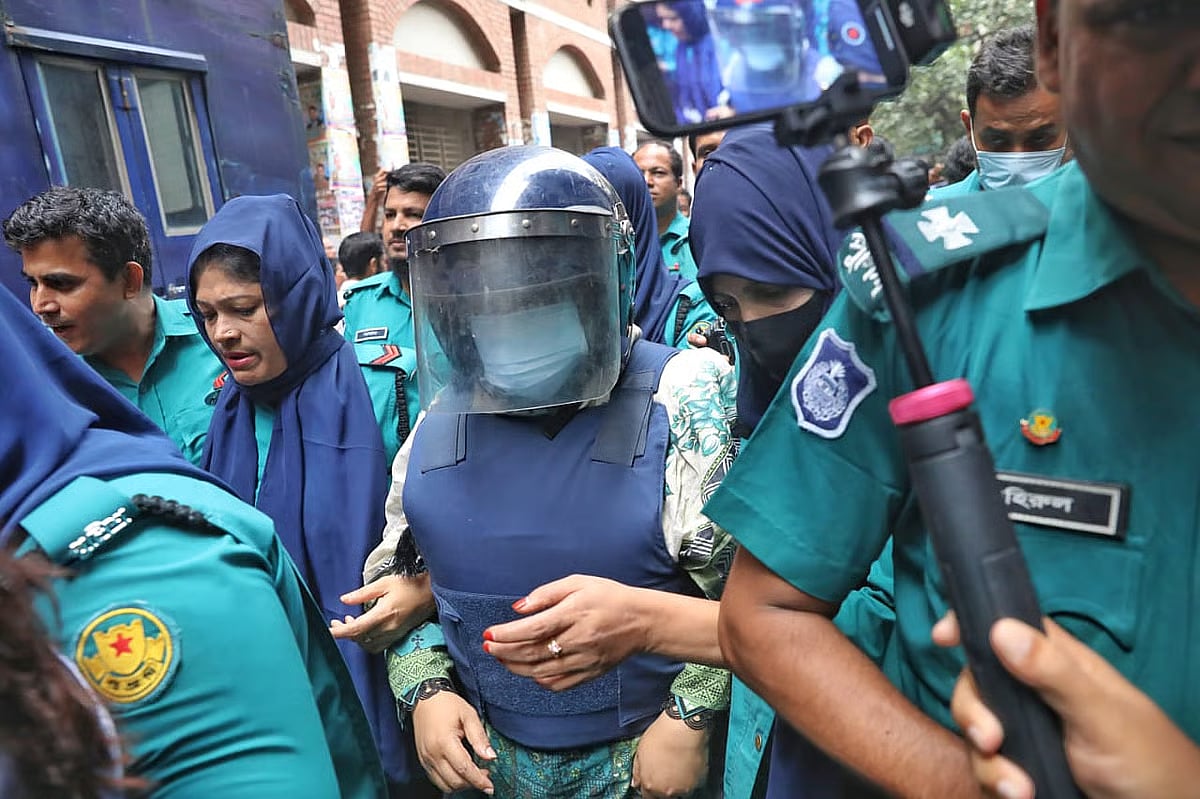 Police escort former member of parliament Momtaz Begum to Chief Metropolitan Magistrate (CMM) Court in Dhaka on 30 June 2025.