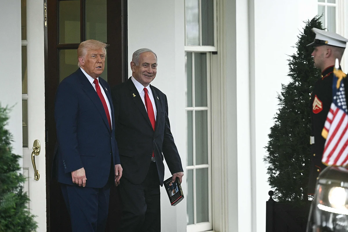 US President Donald Trump walks with Israeli Prime Minister Benjamin Netanyahu as Netanyahu departs the White House in Washington, DC, on April 7, 2025