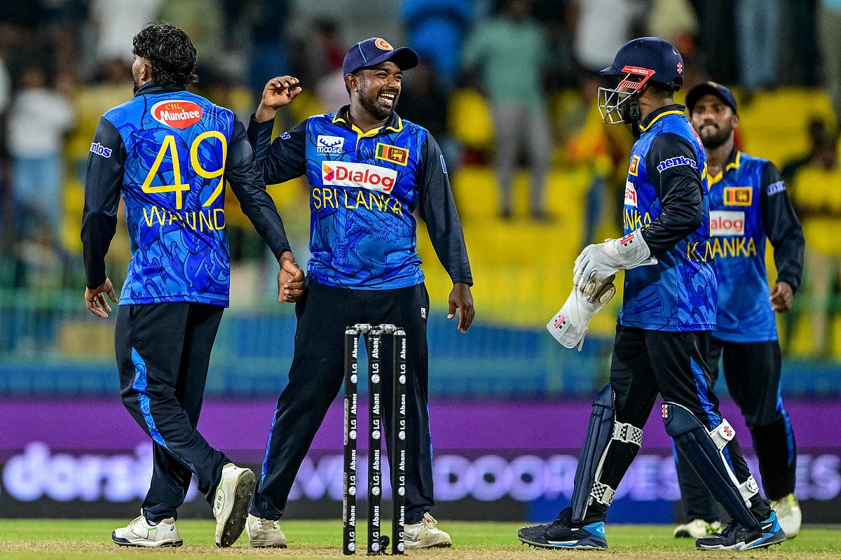 Sri Lanka's captain Charith Asalanka (C) celebrates with teammates after his team's win at the end of the first one-day international (ODI) cricket match between Sri Lanka and Bangladesh at the R. Premadasa International Cricket Stadium in Colombo on 2 July 2025.
