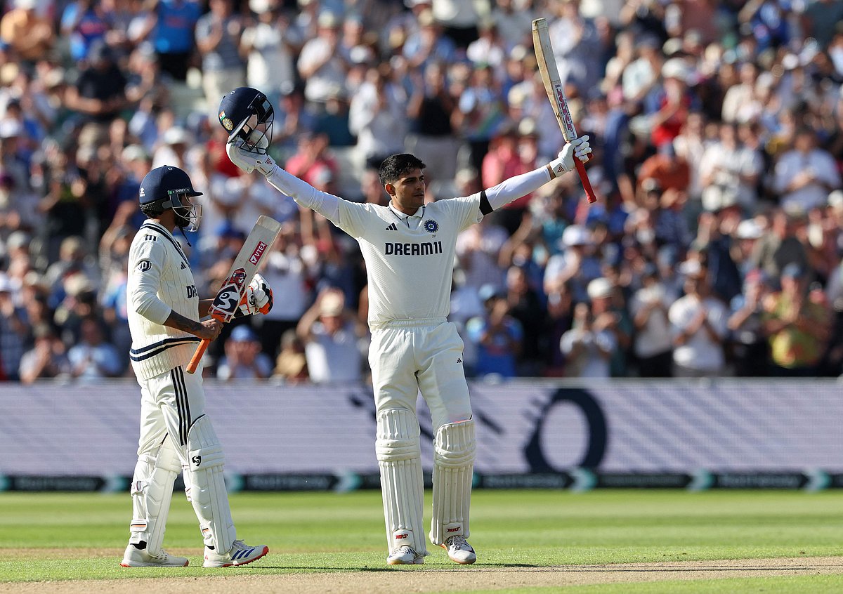 India’s captain Shubman Gill (R) celebrates his century on the opening day of the second cricket test match between England and India at Edgbaston cricket ground in Birmingham, central England on 2 July 2025