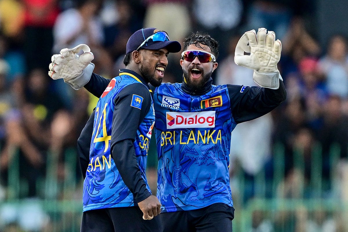 Sri Lanka's Kusal Mendis (R) celebrates with teammate Nishan Madushka after taking the dismissal of Bangladesh's Hasan Mahmud during the second one-day international (ODI) cricket match between Sri Lanka and Bangladesh at the R. Premadasa International Cricket Stadium in Colombo on 5 July 2025