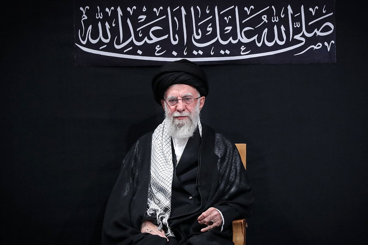 This handout picture released by the office of Iran's Supreme Leader Ayatollah Ali Khamenei on 5 July, 2025 shows him attending a mourning ceremony in Tehran marking the ninth day of the Islamic month of Muharram in the lead-up to Ashura, a 10-day period commemorating the seventh century killing of Prophet Mohammed's grandson Imam Hussein.