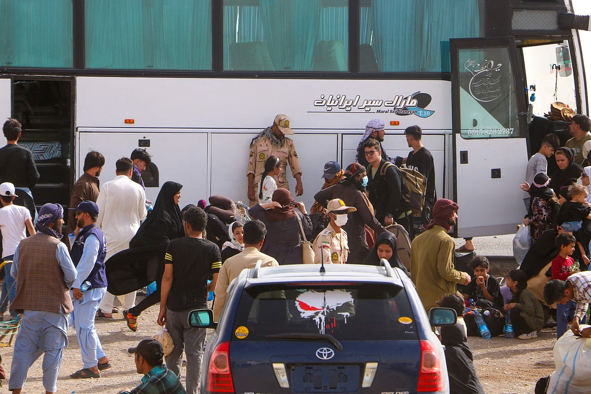 Afghan refugees arrive from Iran at Islam Qala border between Afghanistan and Iran, on 5 July, 2025