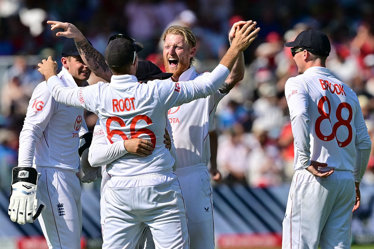 England's captain Ben Stokes (C) celebrates with teammates after taking the wicket of India's Karun Nair on the second day of the third cricket test match between England and India at Lord's cricket ground in London, on 11 July, 2025.