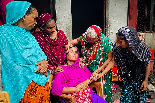 Marzina Begum says no words after losing his son Ramzan Kazi during violence over the NCP rally in Gopalganj on 17 July, 2025. 