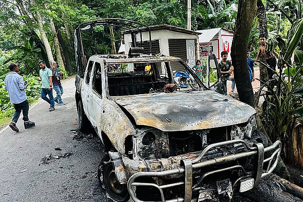 A police vehicle was torched at Khatiyagor Charpara in Ulpur union of Sadar upazila.