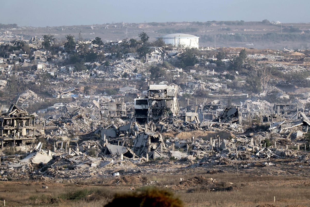 This picture taken from a position on the Israeli border with the Gaza Strip, shows destroyed buildings in the besieged Palestinian territory on 17 July 2025.