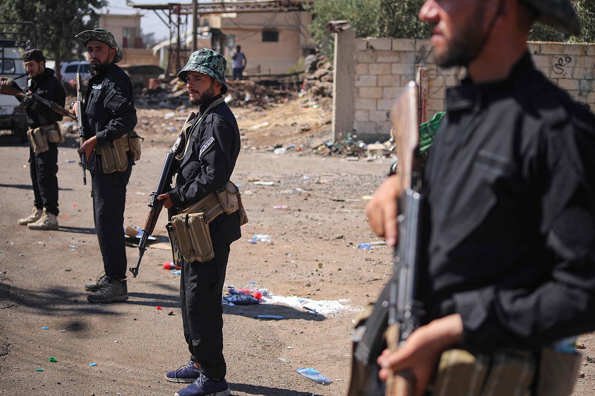 Syrian security forces deploy in Walga town amid clashes between tribal and bedouin fighters on one side, and Druze gunmen on the other, near the predominantly Druze city of Sweida in southern Syria on 19 July, 2025.