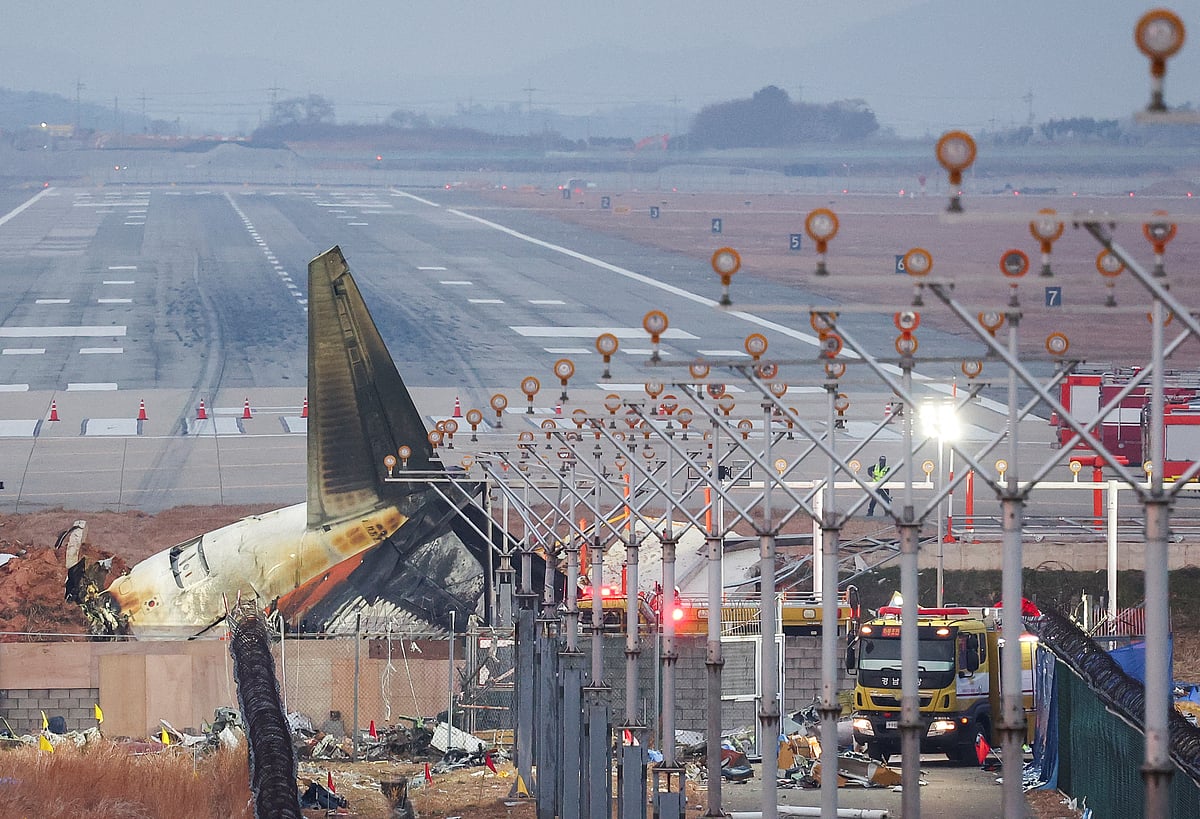 The wreckage of the Jeju Air aircraft that went off the runway and crashed lies at Muan International Airport, in Muan, South Korea, 30 December 2024.