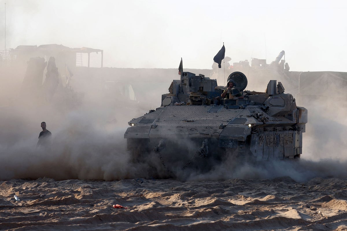 Israeli troops man a position near the border with the Gaza Strip on 21 July 2025