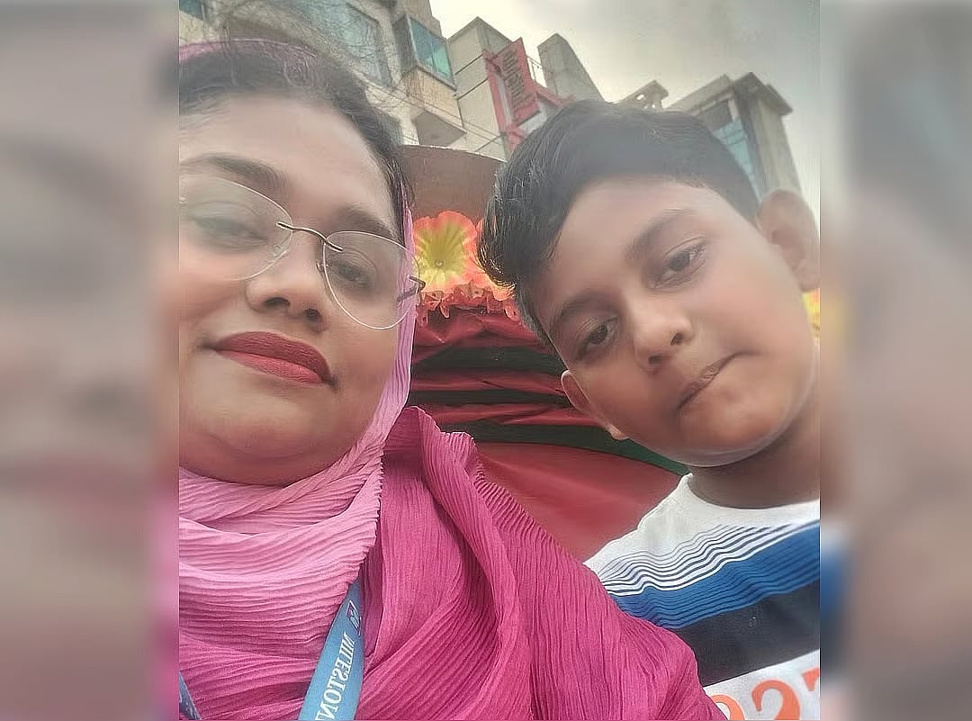 Milestone School and College teacher Taslima Akter with her son Masnun Rahman Sinan