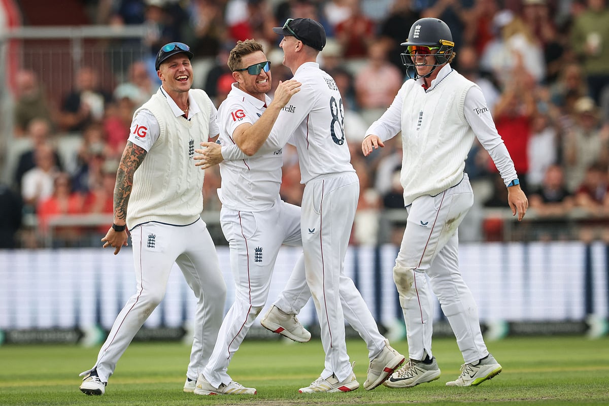 England’s Liam Dawson (2nd L) celebrates taking the wicket of India’s Yashasvi Jaiswal on day one of the fourth cricket test match between England and India at Old Trafford, in Manchester, north England, on 23 July 2025