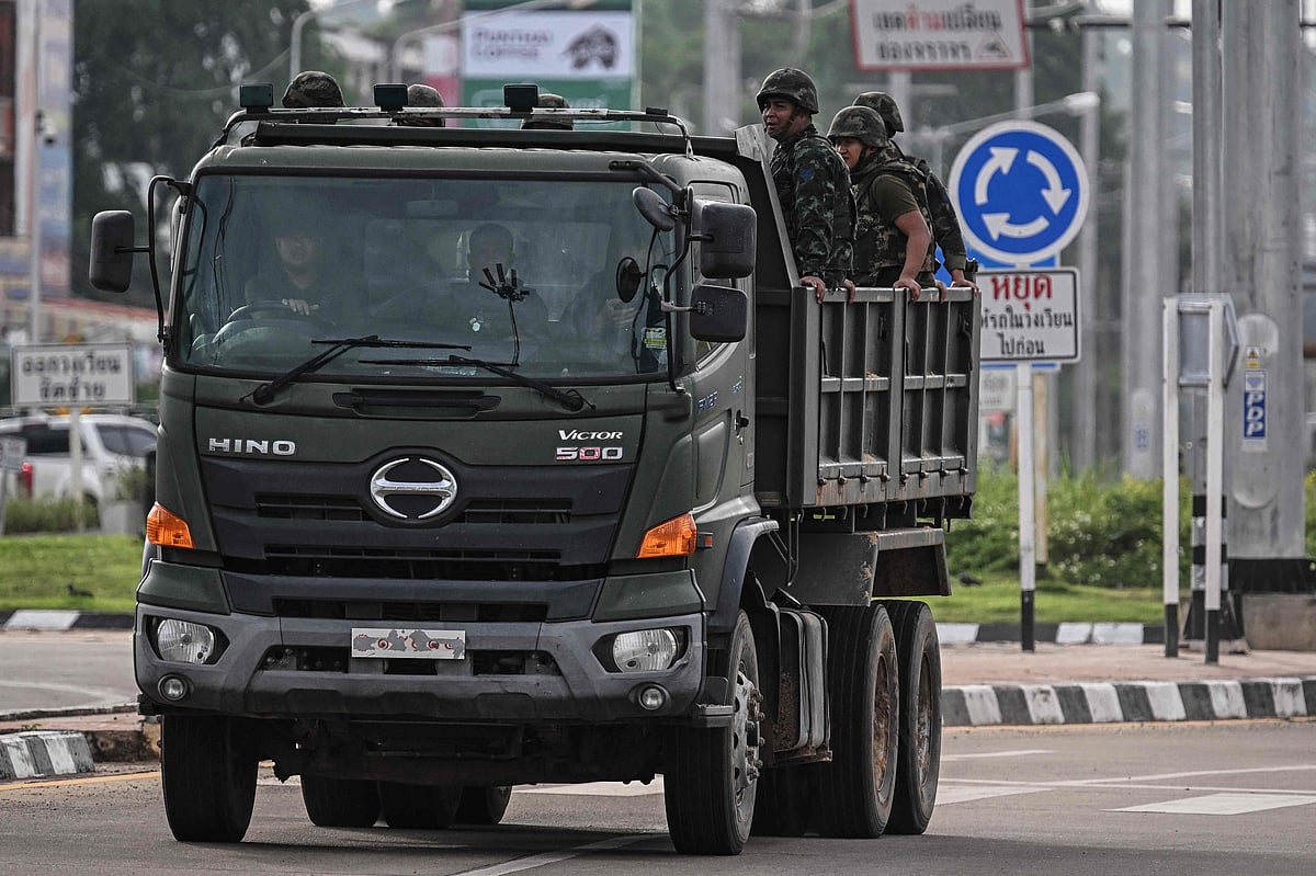 Royal Thai Army soldiers are transported on the back of an army truck in the Thai border province of Si Sa Ket on July 26, 2025