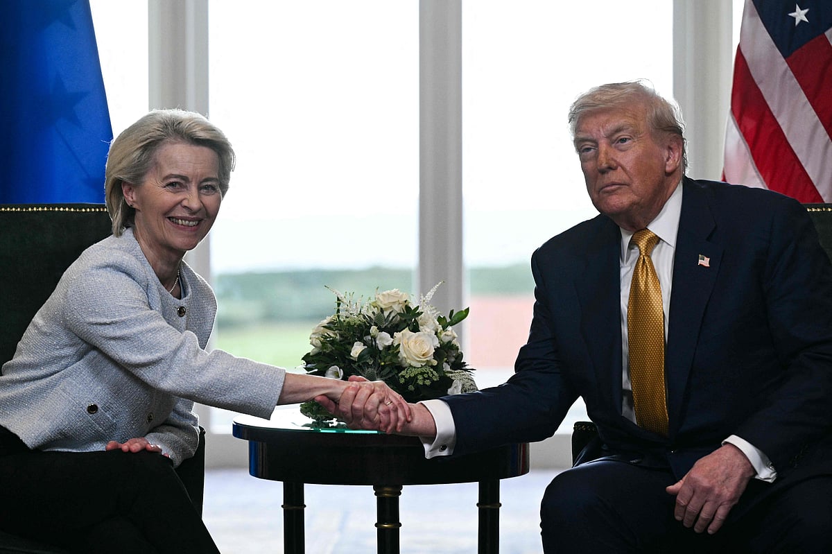 US President Donald Trump (R) shakes hands with European Commission President Ursula von der Leyen (L) following their meeting, in Turnberry south west Scotland on 27 July, 2025, on the third day of his visit to the country, since his second tenure as President began.