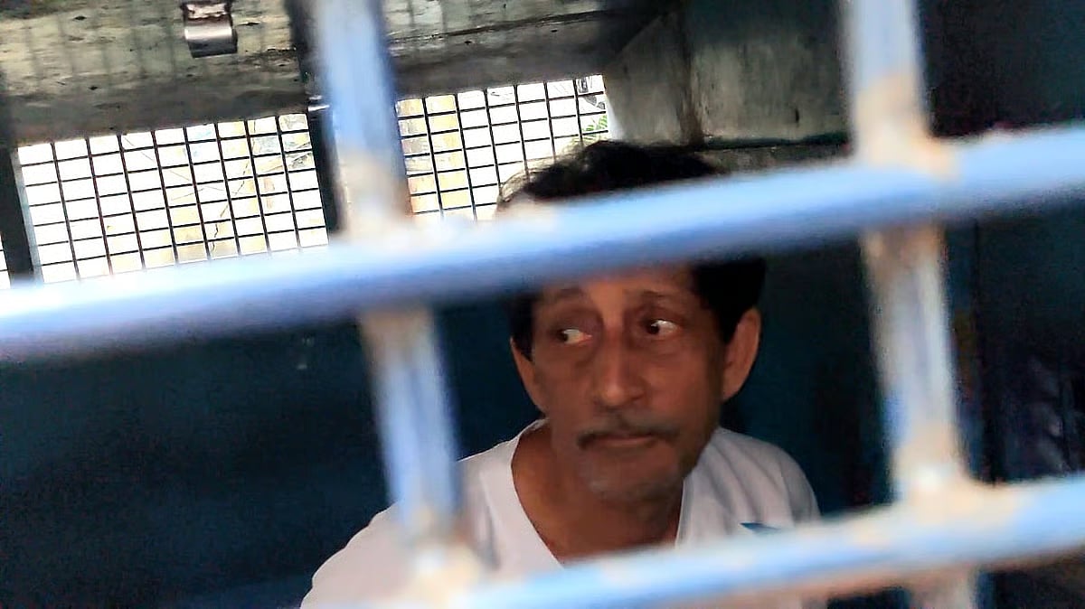 Former Janata Bank chairman and retired Dhaka University professor Abul Barkat inside the prison van near CMM Court, Dhaka on 28 July 2025