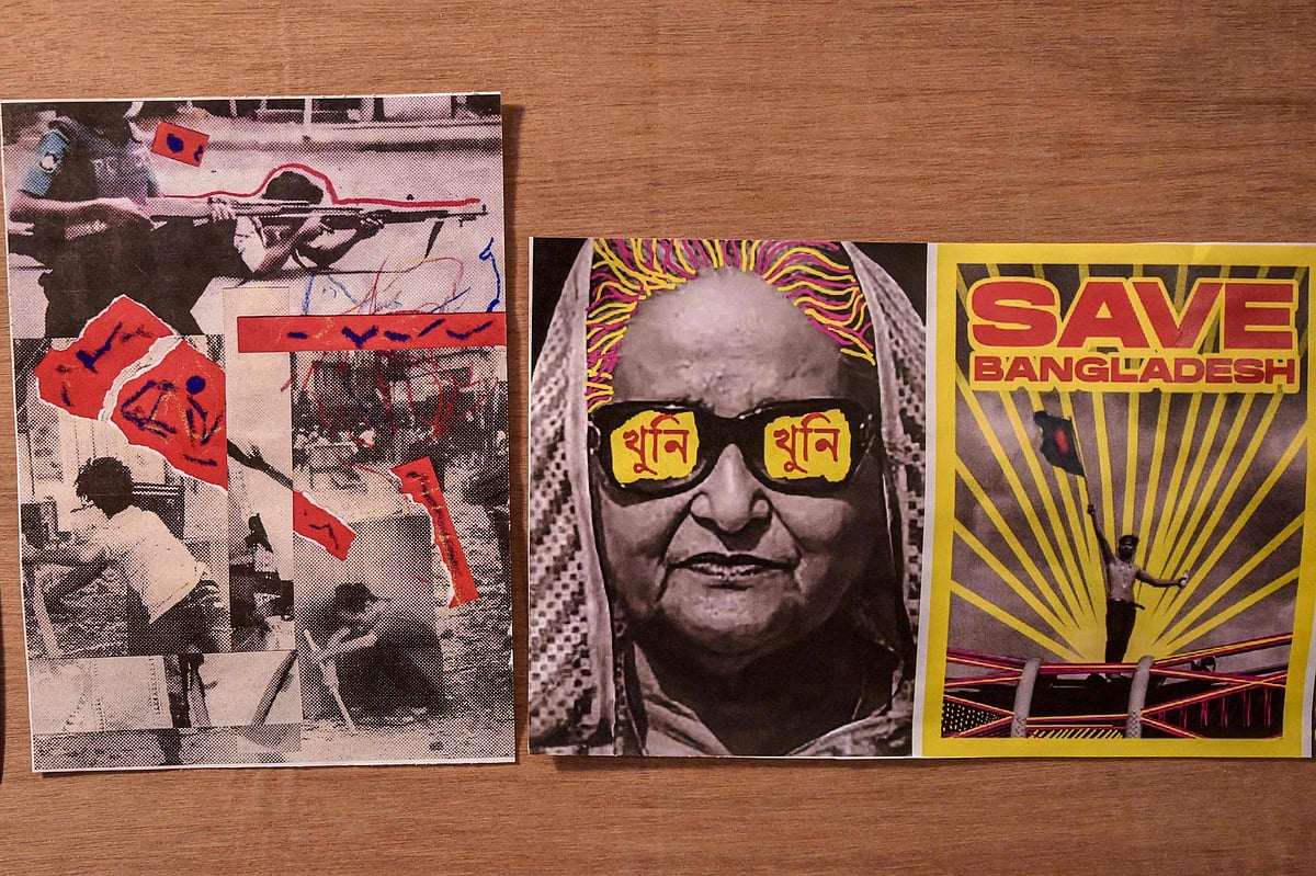 In this photograph taken on 28 July 2025, images and cartoons related to Bangladesh's ousted prime minister Sheikh Hasina are seen pasted on a board inside her former official residence before the inauguration of the July Memorial Museum in Dhaka.