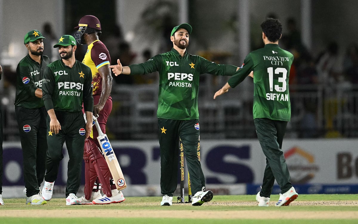 Pakistan’s captain Salman Ali Agha (2R) and Sufiyan Muqeem (R) celebrate after their team won the third Twenty20 (T20) international, sealing a 2–1 series victory over West Indies, at Central Broward Park & Broward County Stadium in Lauderhill, Florida, on 3 August 2025.