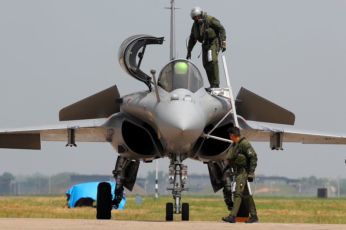 An Indian Air Force pilot gets out of a Rafale fighter jet during its induction ceremony at an air force station in Ambala, India, 10 September 2020.