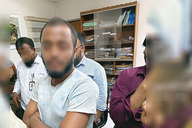 A college student was detained by students at Dhaka University’s TSC for allegedly recording videos of female protesters inappropriately.