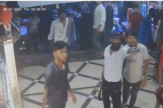 A couple of men with sharp weapons at the Chandana intersection of Gazipur city. Thursday night
